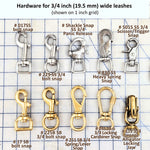 Collection of various leash hardware clips for three-quarter inch wide leashes on a grid background
