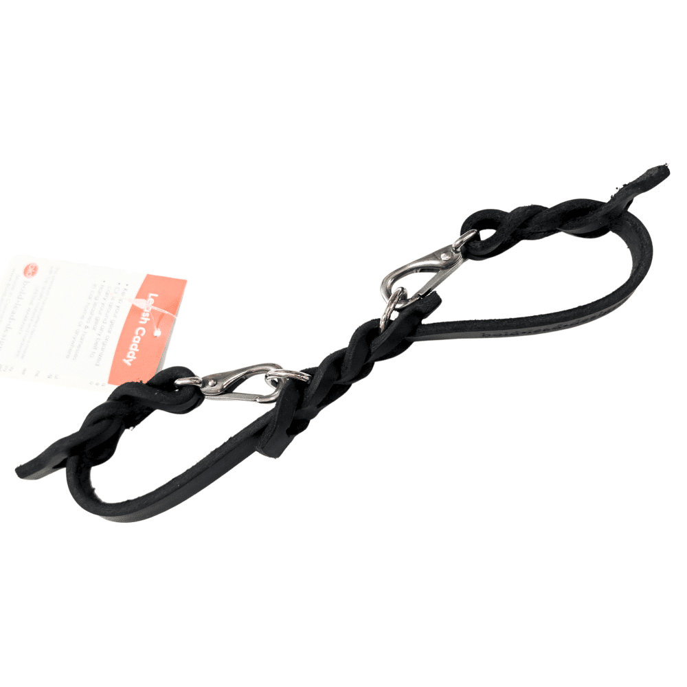 Black leather leash caddy with metal clips on a white background