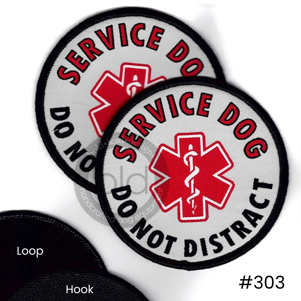 Two 'Service Dog Do Not Distract' patches with red star of life symbol on a white background.
