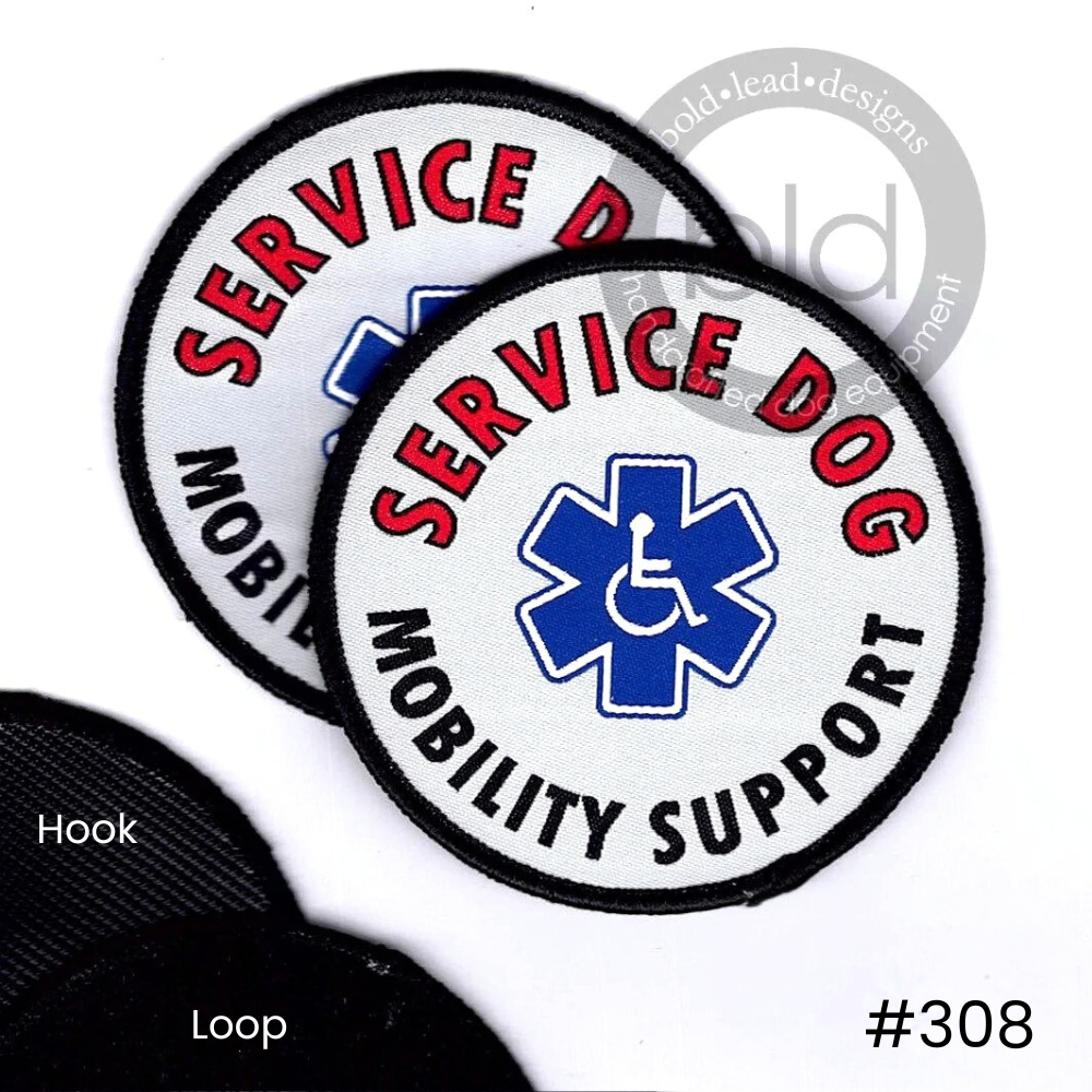 Two 'Service dog mobility support' patches with blue disabled symbol on a white background and a sample of loop and hook Velcro backing