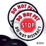 Two patches with 'Do Not Pet', 'Stop', and 'Do Not Distract' text on a white background.