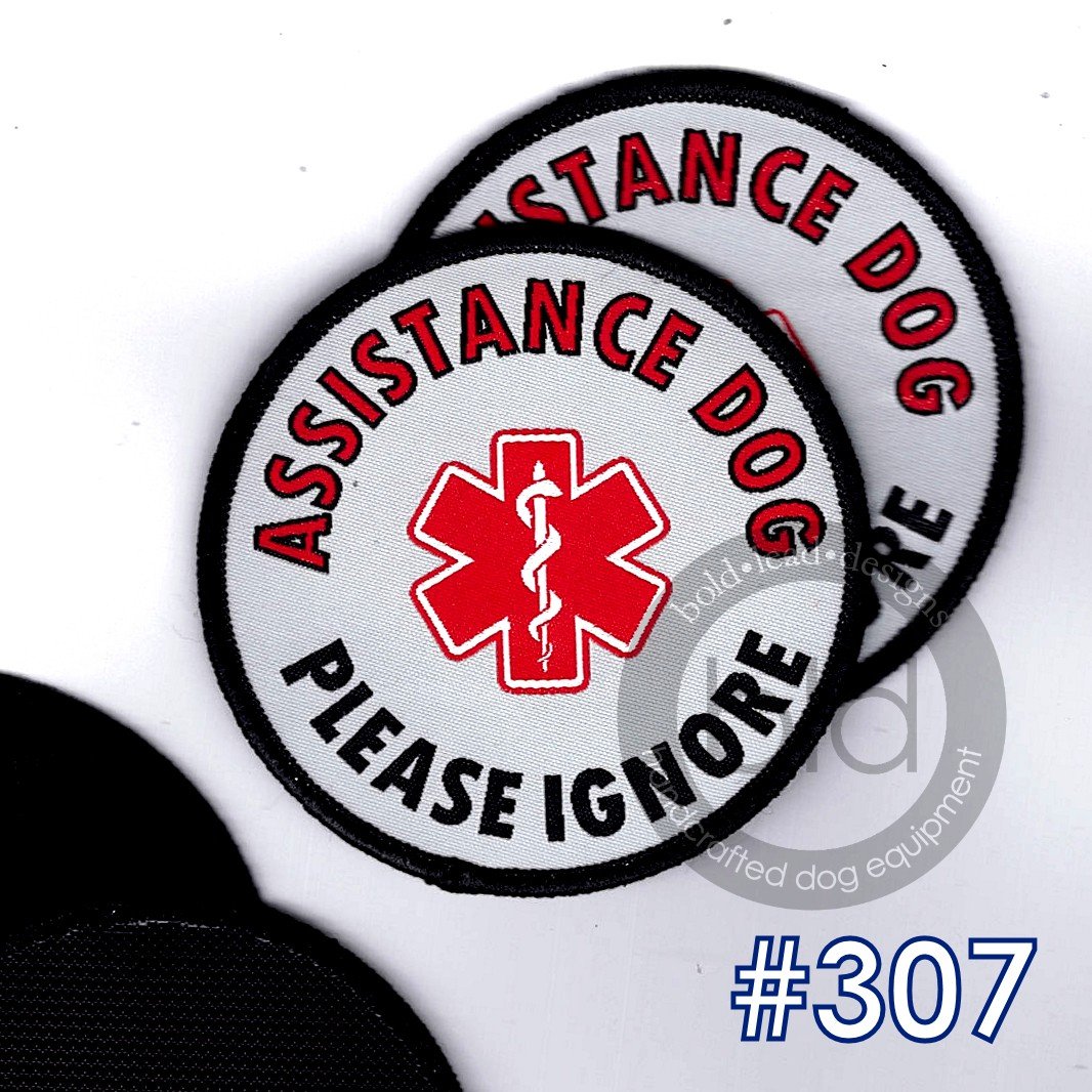 Assistance dog patch with red star of life symbol and text 'Please Ignore'  leash wraps with loop and hook options on a white background.