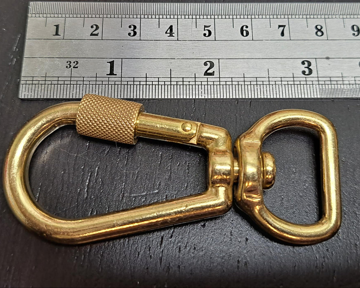 XL 3/4 inch size locking carabiner next to ruler for scale