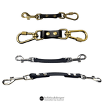 display of 4 brahma safety cords and connectors on white background