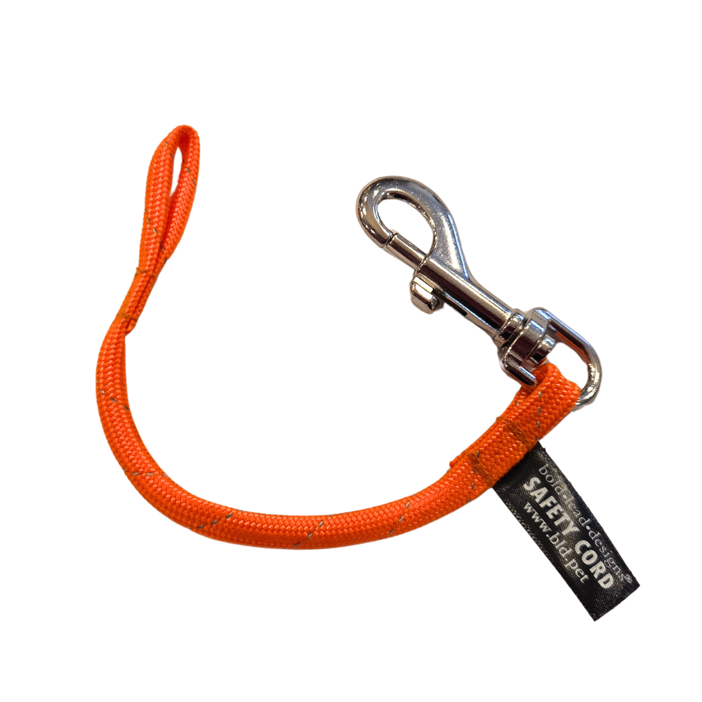 reflective orange safety cordon white background