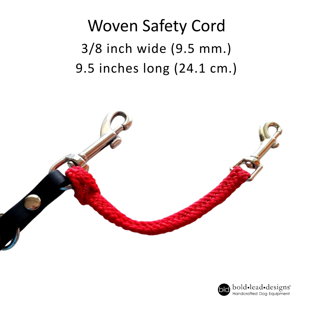 Red woven safety cord connected to the snap on a black leash on a white background, featuring product details.