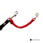 Red woven safety cord connector strap attached to a silver snap hook on a black leash a white background, featuring 'bold lead designs' branding.